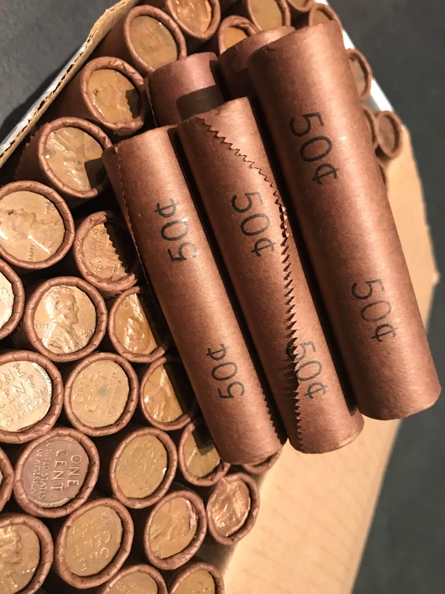 TIGHTLY CRIMPED ROLLS OF OLD WRAPPED WHEAT PENNIES