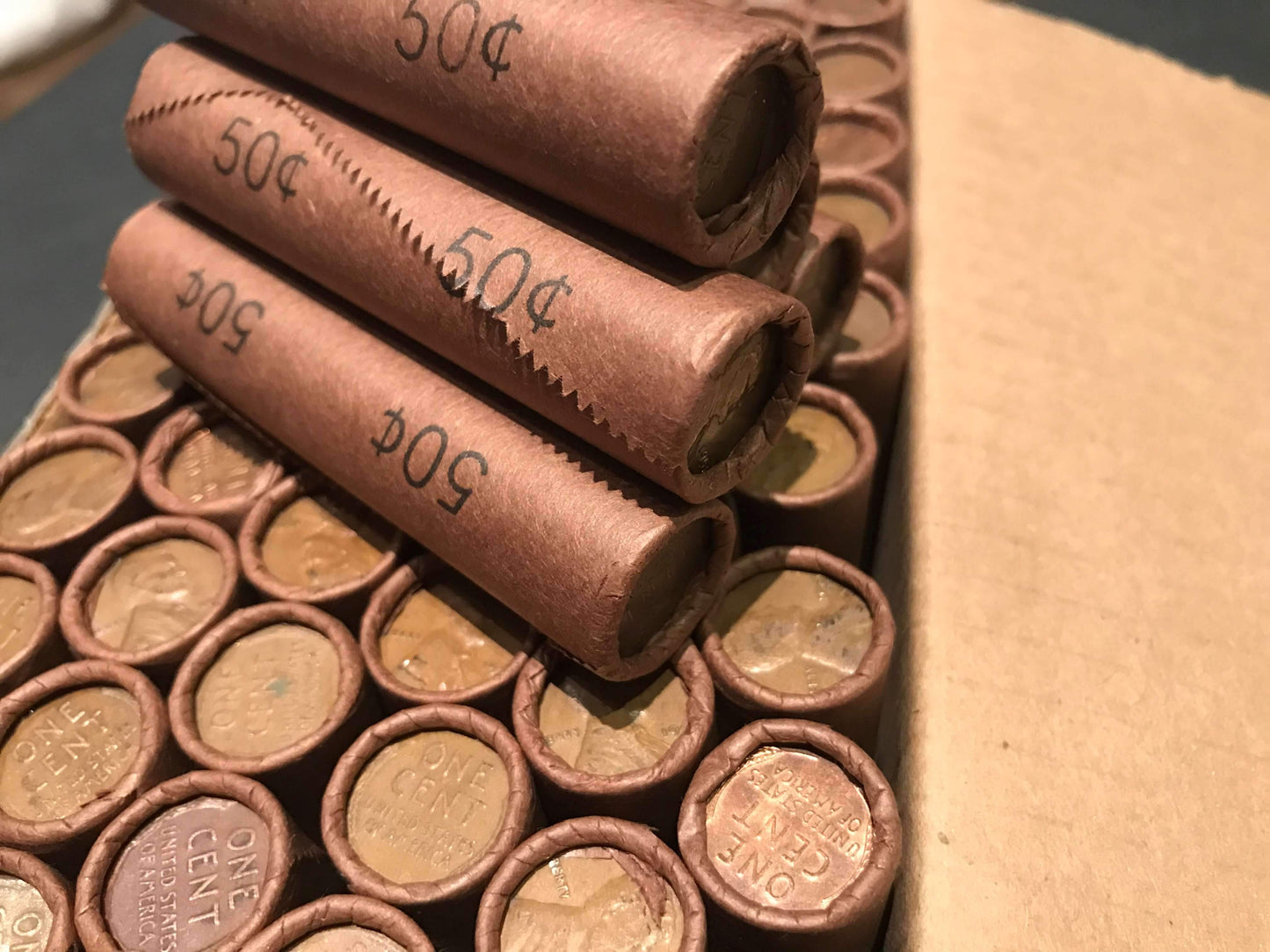 TIGHTLY CRIMPED ROLLS OF OLD WRAPPED WHEAT PENNIES