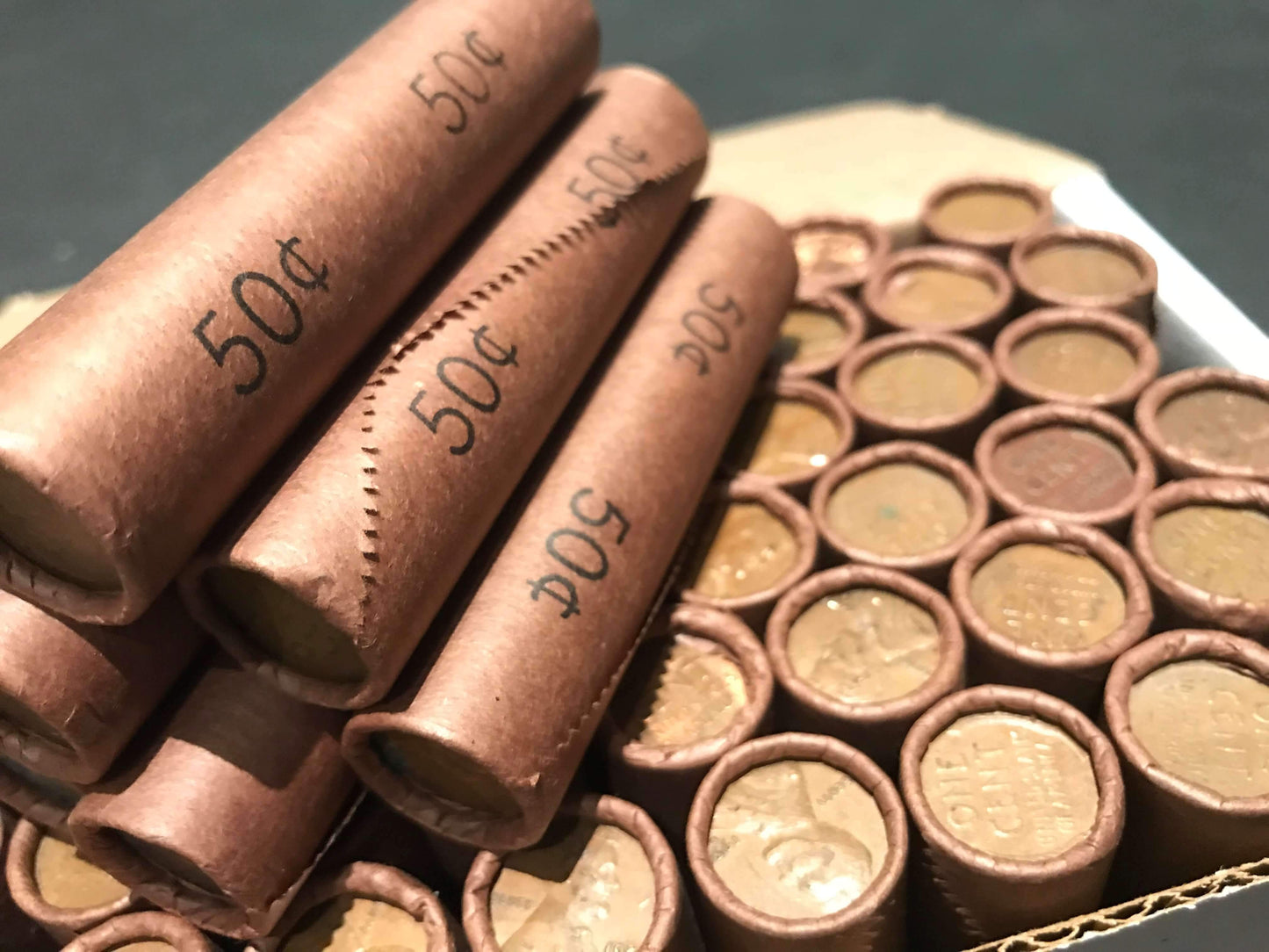 TIGHTLY CRIMPED ROLLS OF OLD WRAPPED WHEAT PENNIES