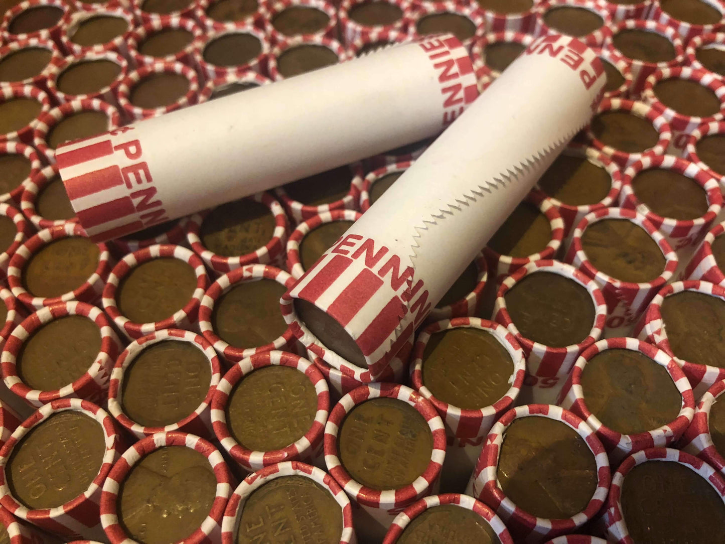 TIGHTLY CRIMPED ORIGINAL BANK WRAPPED ROLLS OF EARLY DATE WHEAT CENTS (1909-1939)