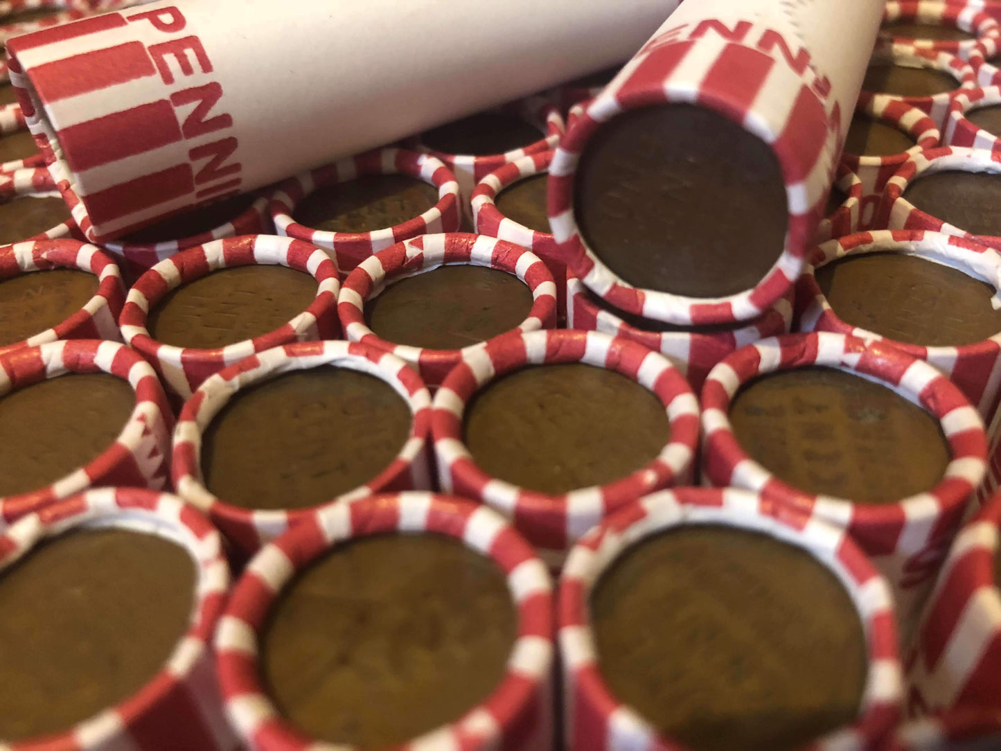 TIGHTLY CRIMPED ORIGINAL BANK WRAPPED ROLLS OF EARLY DATE WHEAT CENTS (1909-1939)