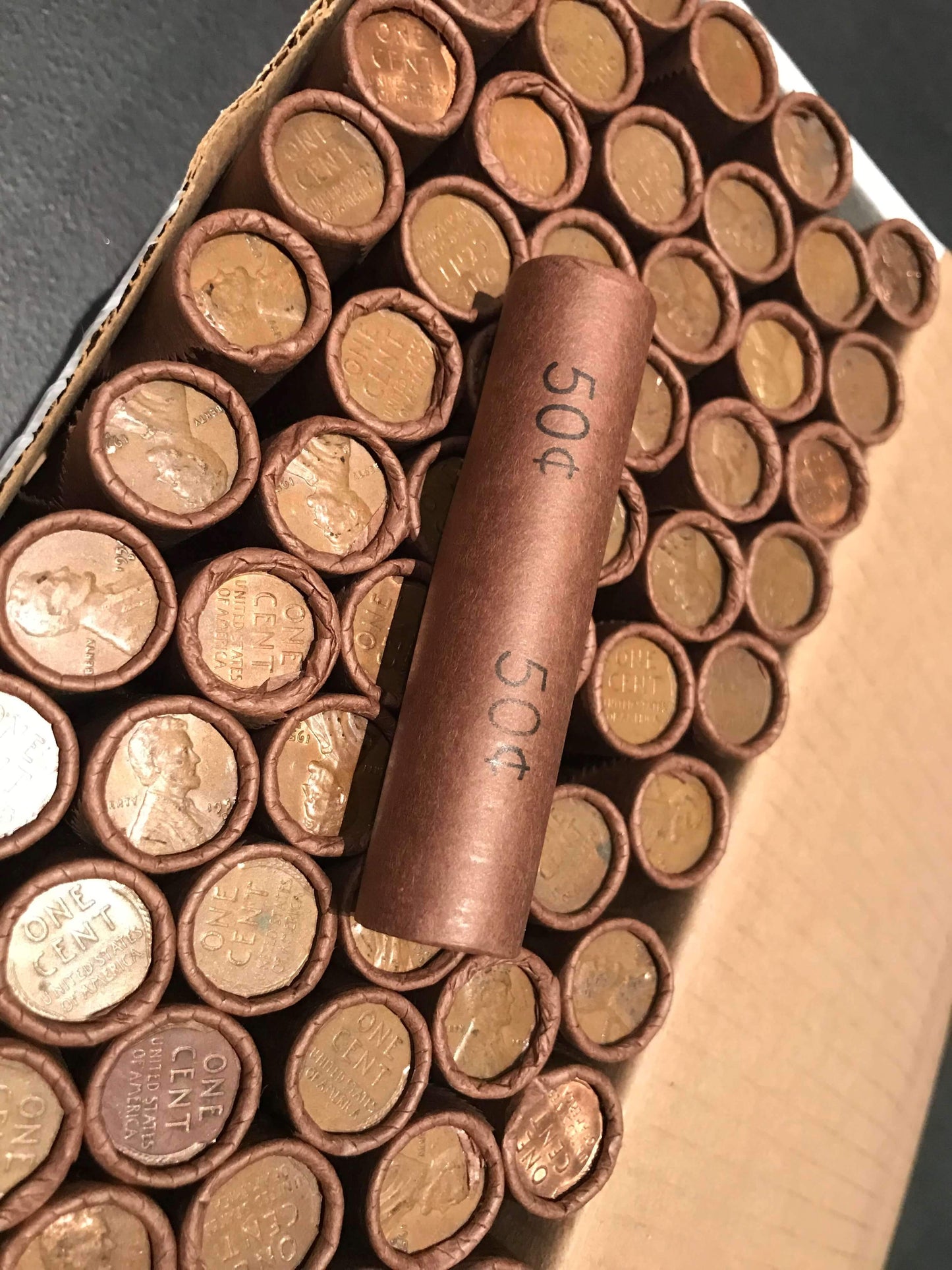 TIGHTLY CRIMPED ROLLS OF OLD WRAPPED WHEAT PENNIES