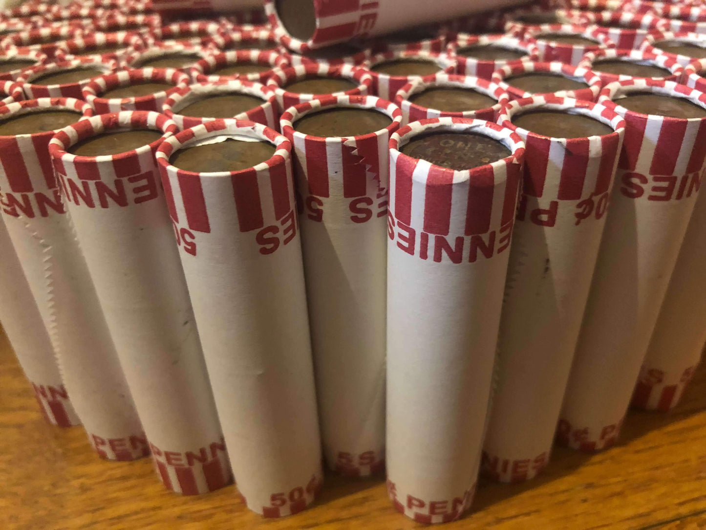 TIGHTLY CRIMPED ORIGINAL BANK WRAPPED ROLLS OF EARLY DATE WHEAT CENTS (1909-1939)