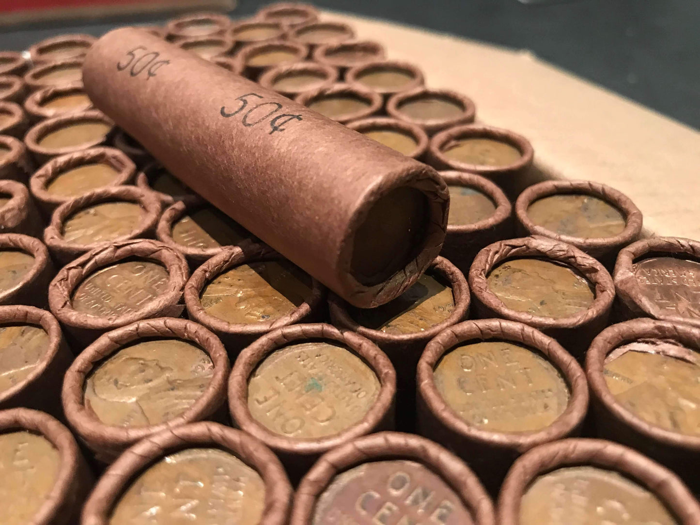 TIGHTLY CRIMPED ROLLS OF OLD WRAPPED WHEAT PENNIES