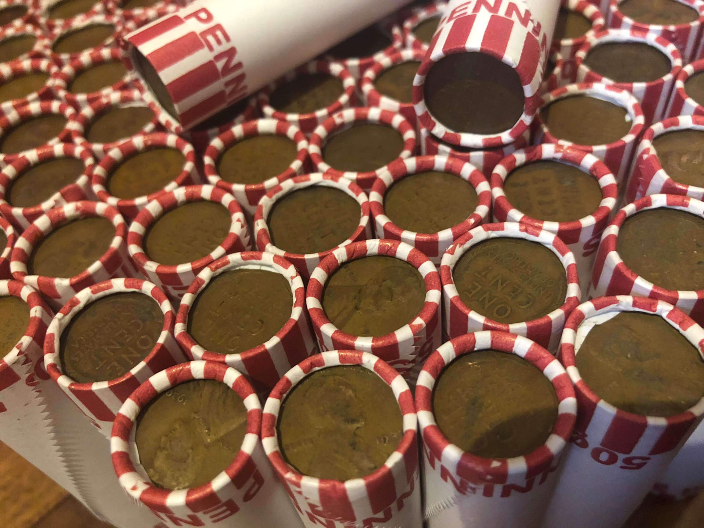 TIGHTLY CRIMPED ORIGINAL BANK WRAPPED ROLLS OF EARLY DATE WHEAT CENTS (1909-1939)