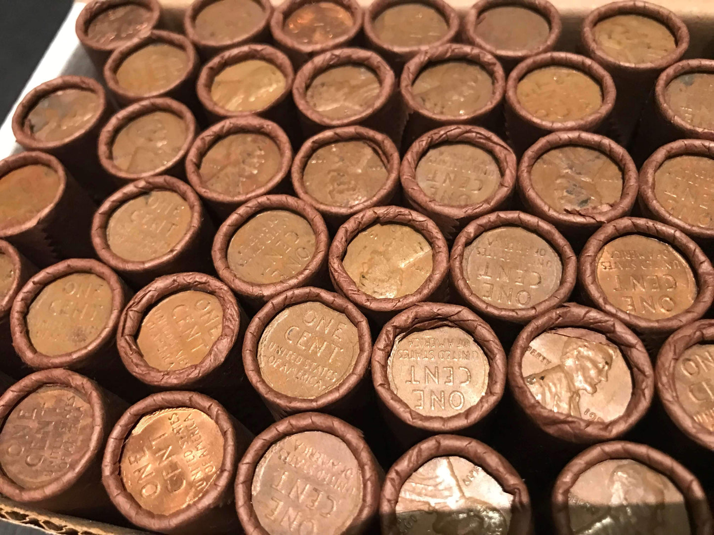 TIGHTLY CRIMPED ROLLS OF OLD WRAPPED WHEAT PENNIES