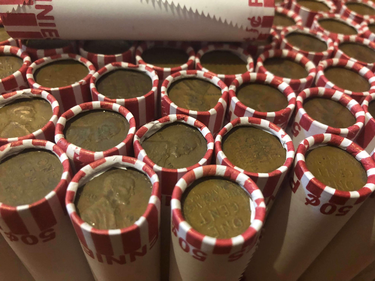 TIGHTLY CRIMPED ORIGINAL BANK WRAPPED ROLLS OF EARLY DATE WHEAT CENTS (1909-1939)