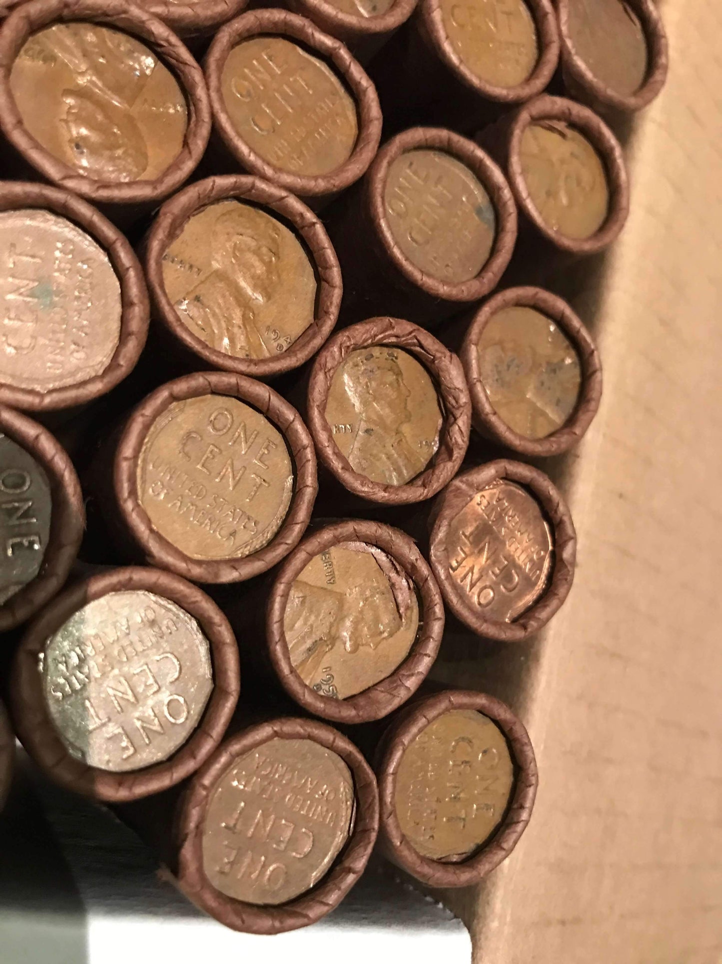 TIGHTLY CRIMPED ROLLS OF OLD WRAPPED WHEAT PENNIES