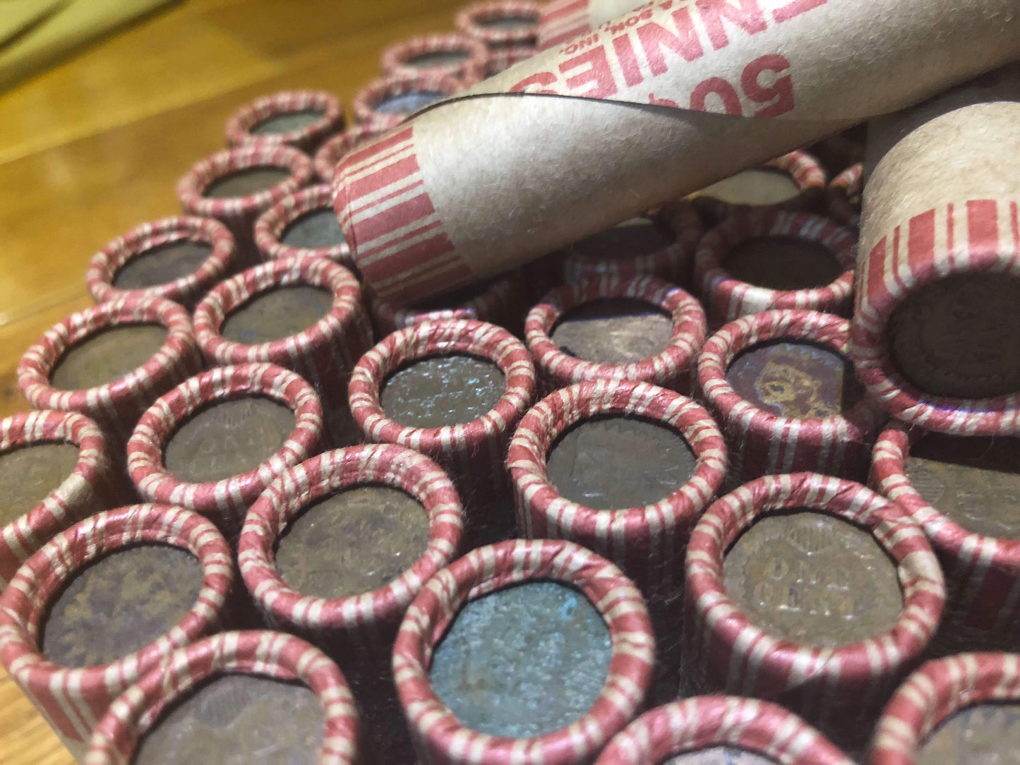 TIGHTLY CRIMPED ROLLS OF OLD UNITED STATES WHEAT & INDIAN HEAD CENTS