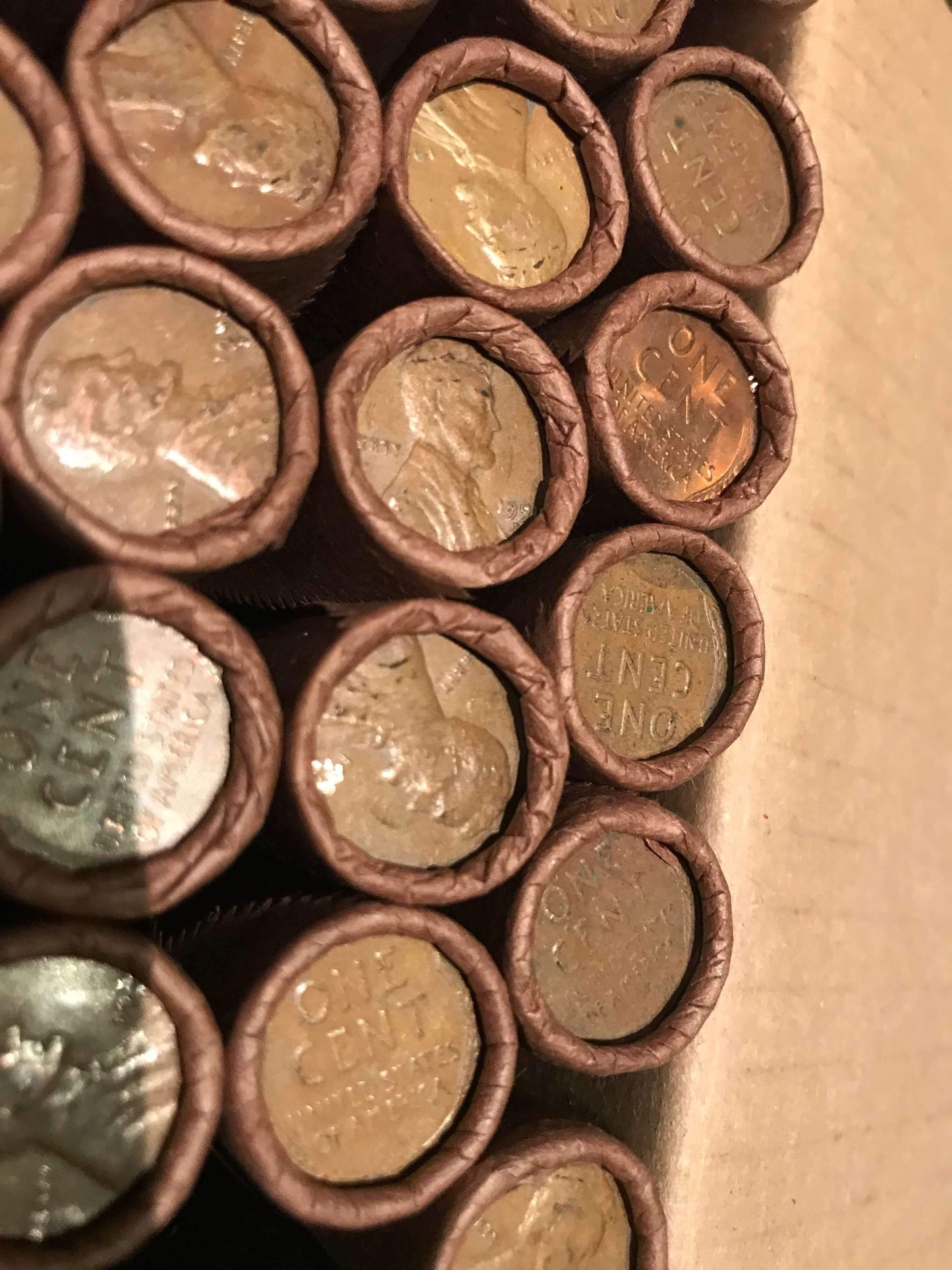 TIGHTLY CRIMPED ROLLS OF OLD WRAPPED WHEAT PENNIES