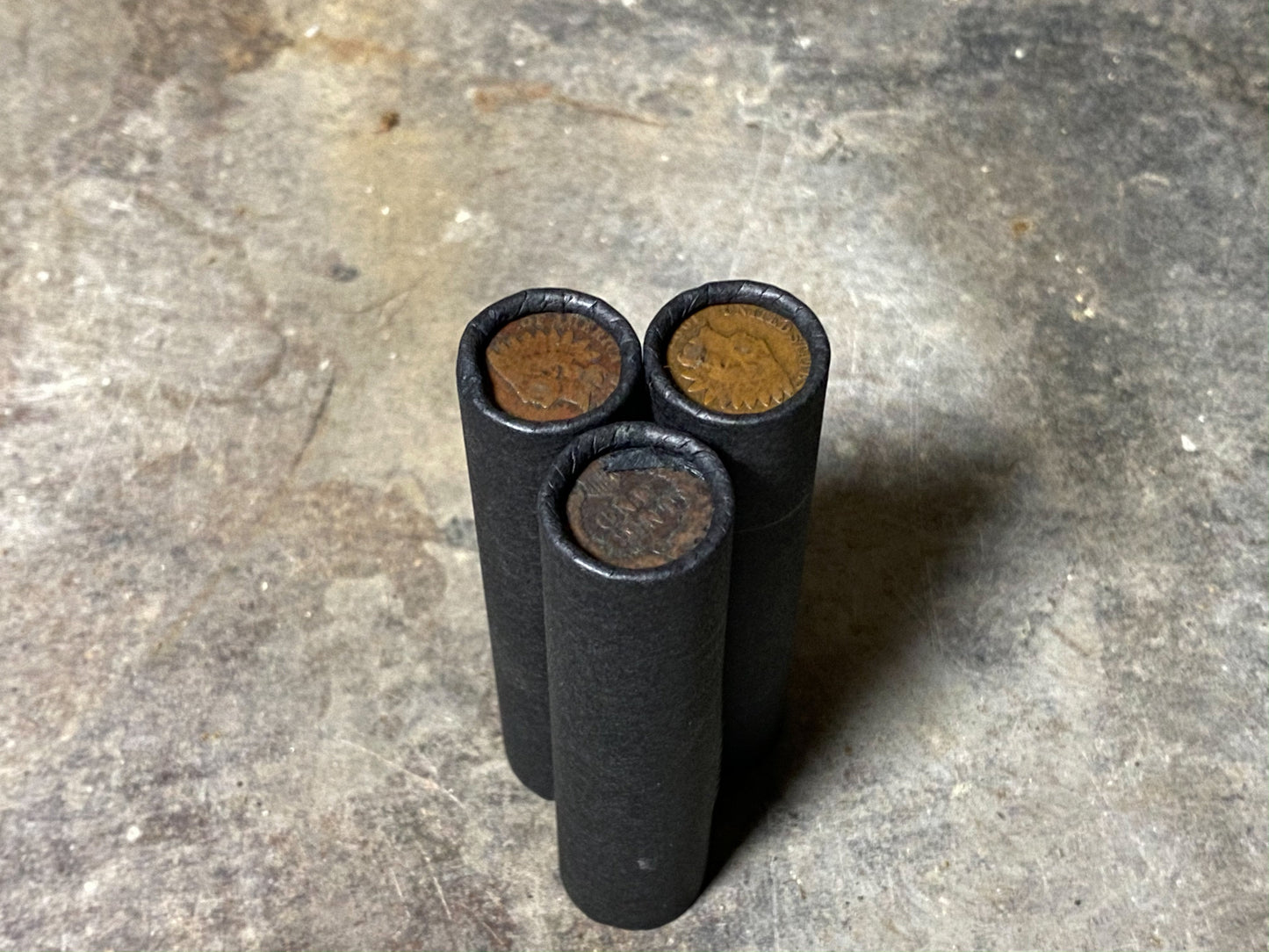 INDIAN HEAD CENT showing on end of old black unsearched us wheat penny roll cent coins estate collection sale lot hoard