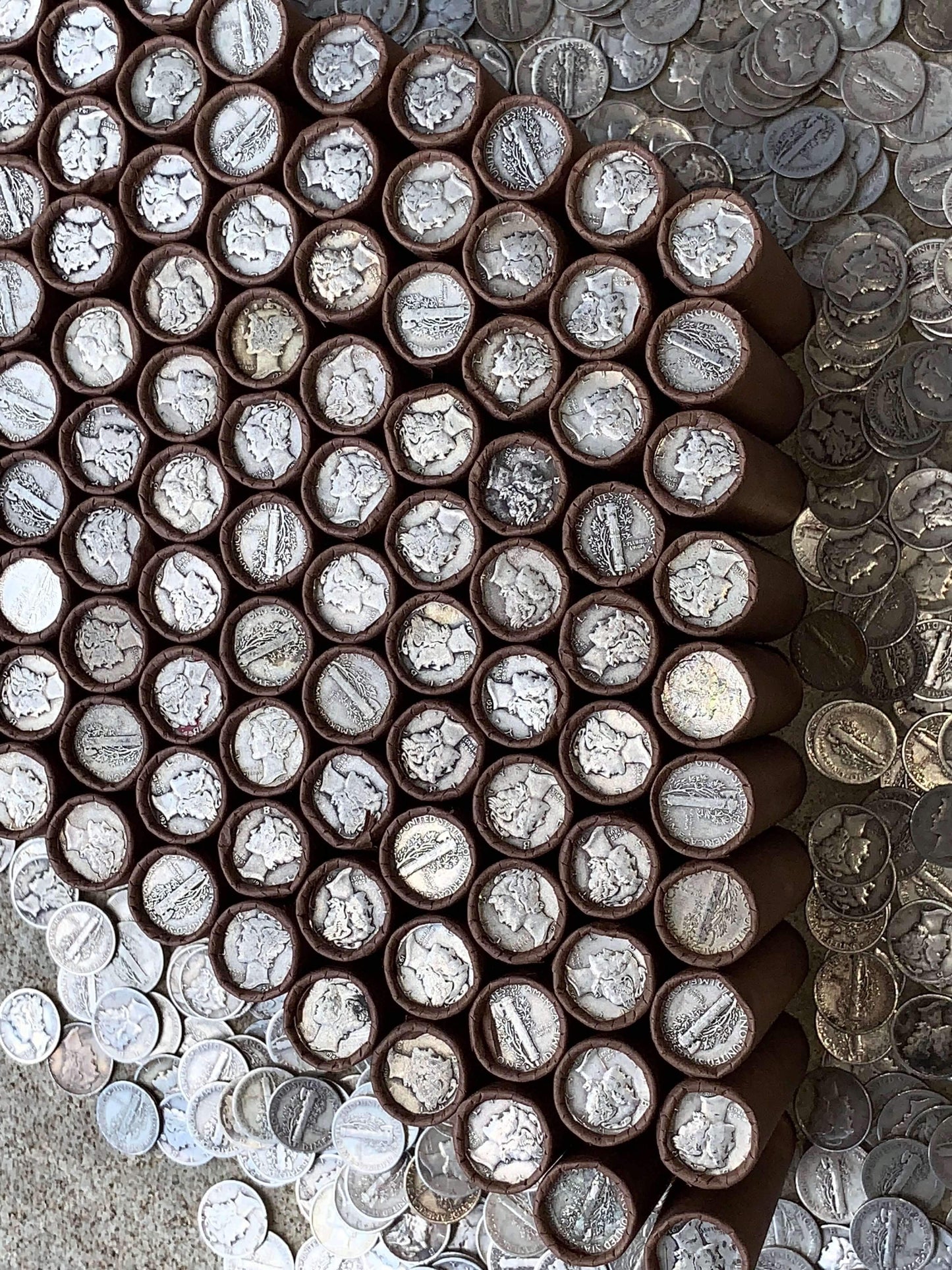 VINTAGE DARK BROWN BANK ROLL WITH A SILVER MERCURY DIME SHOWING