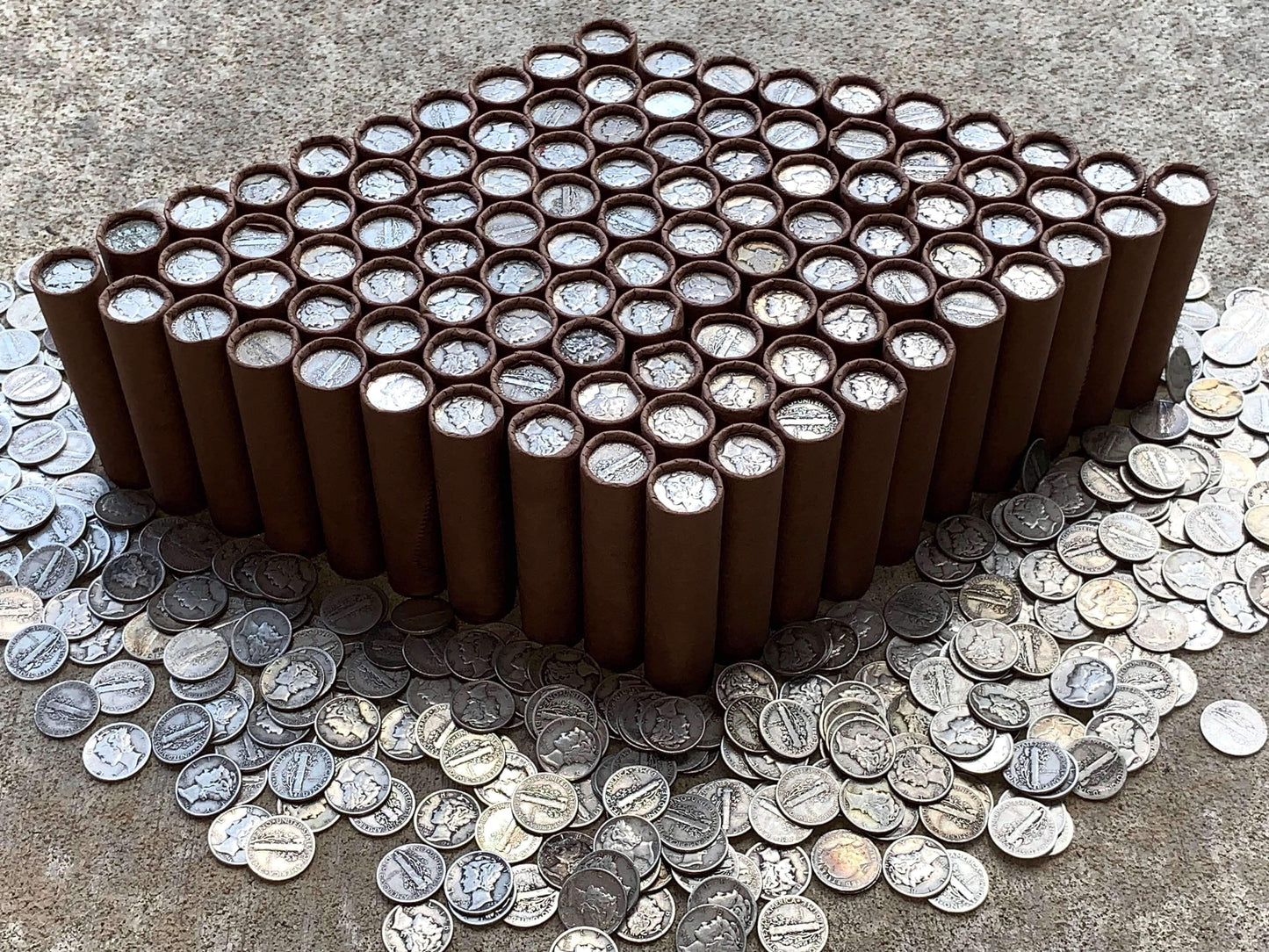 VINTAGE DARK BROWN BANK ROLL WITH A SILVER MERCURY DIME SHOWING