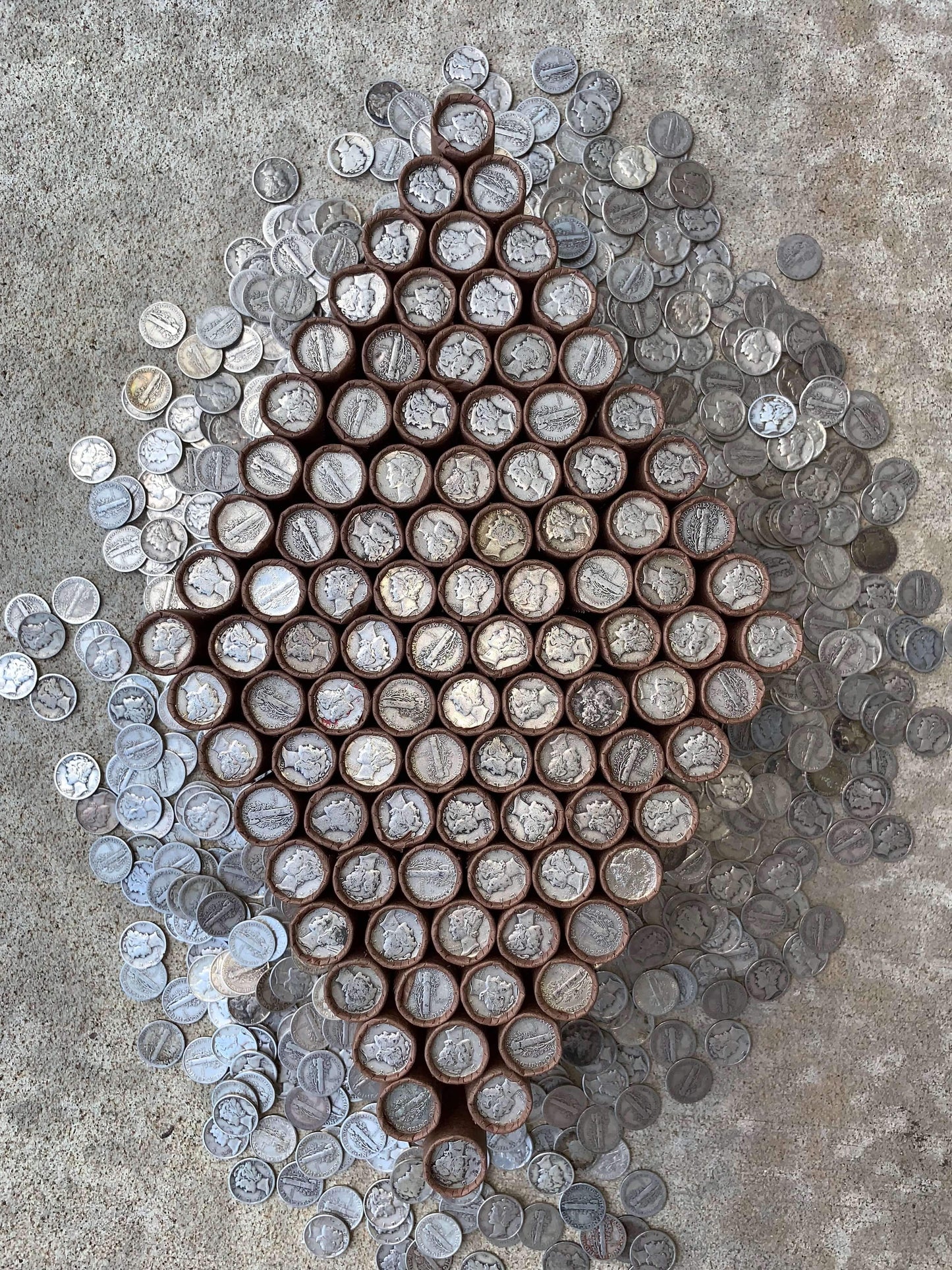 VINTAGE DARK BROWN BANK ROLL WITH A SILVER MERCURY DIME SHOWING