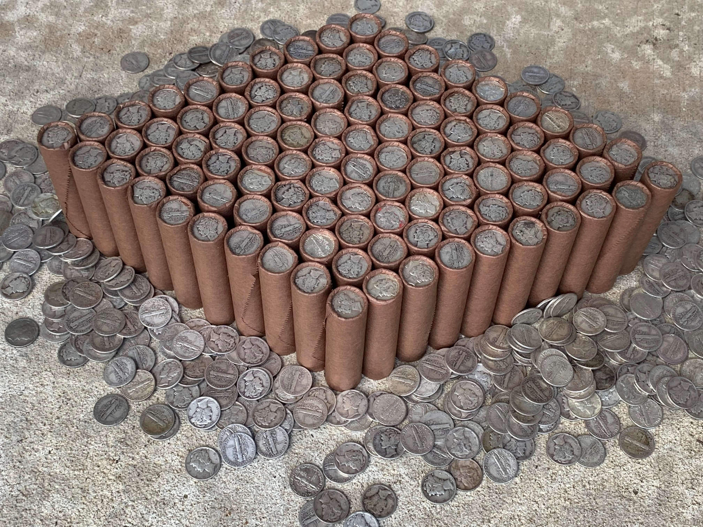 VINTAGE DARK BROWN BANK ROLL WITH A SILVER MERCURY DIME SHOWING