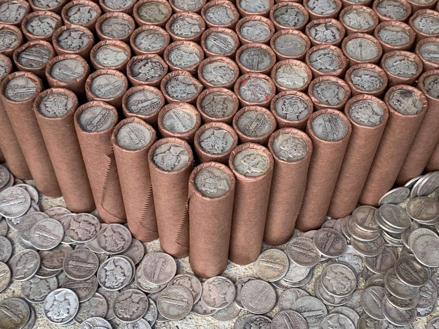 VINTAGE DARK BROWN BANK ROLL WITH A SILVER MERCURY DIME SHOWING