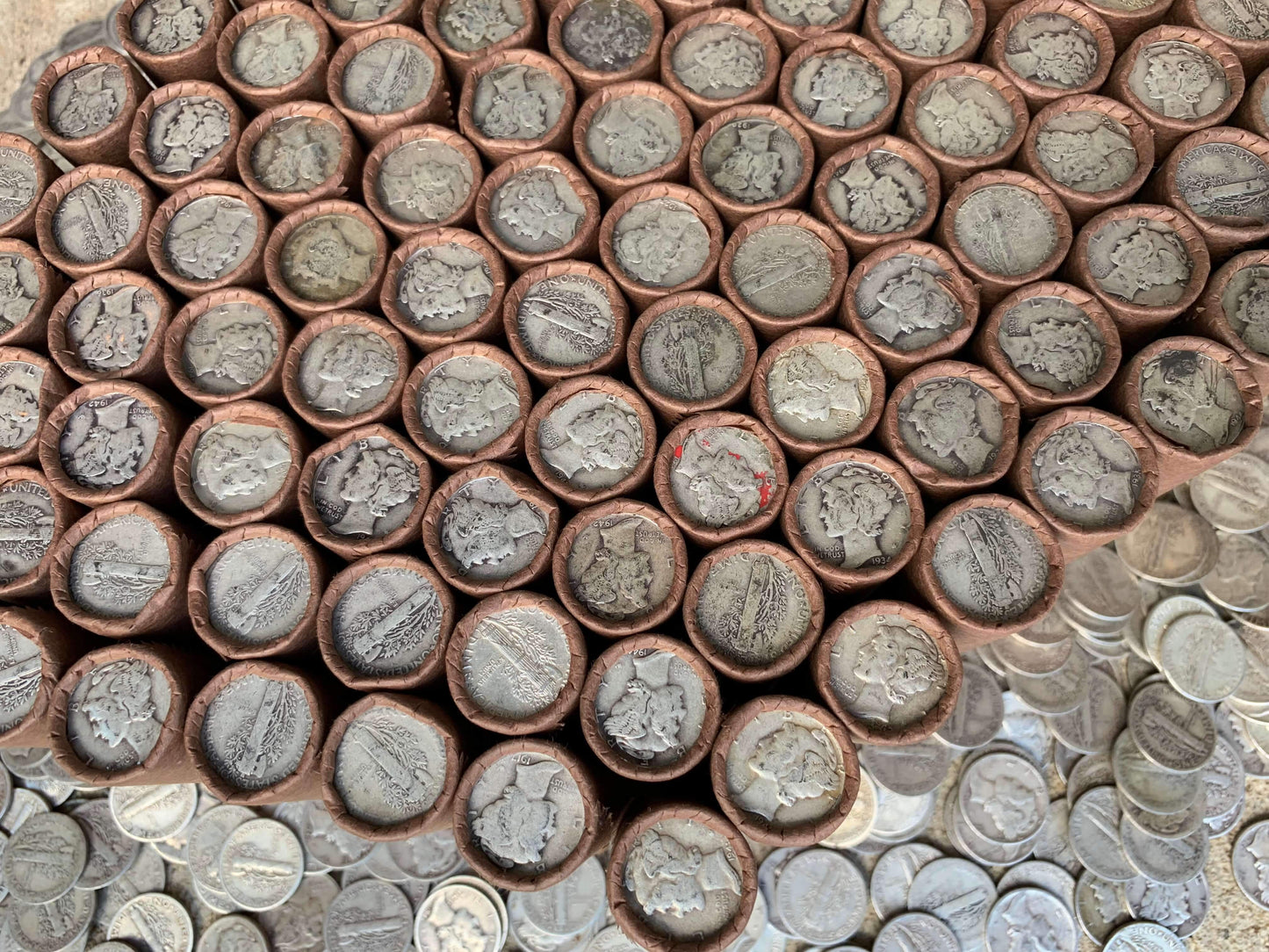 VINTAGE DARK BROWN BANK ROLL WITH A SILVER MERCURY DIME SHOWING