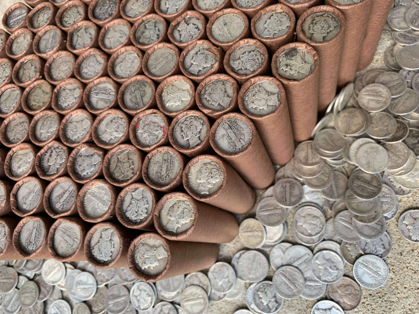 VINTAGE DARK BROWN BANK ROLL WITH A SILVER MERCURY DIME SHOWING