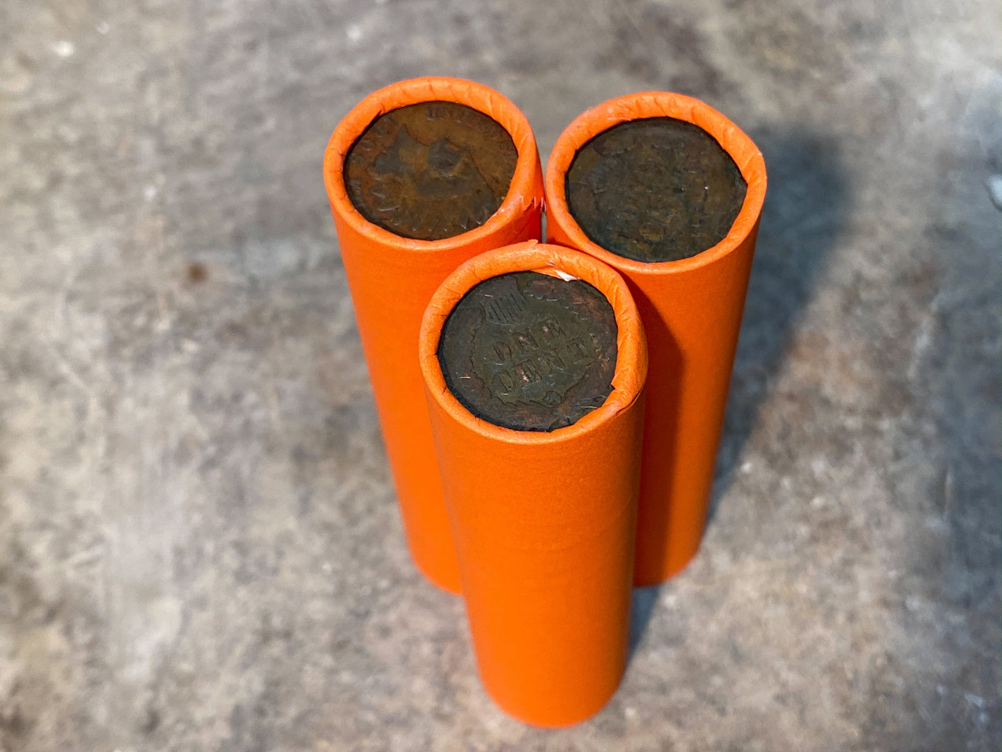 INDIAN HEAD CENT showing on end of old orange unsearched us wheat penny roll cent coins estate collection sale lot hoard