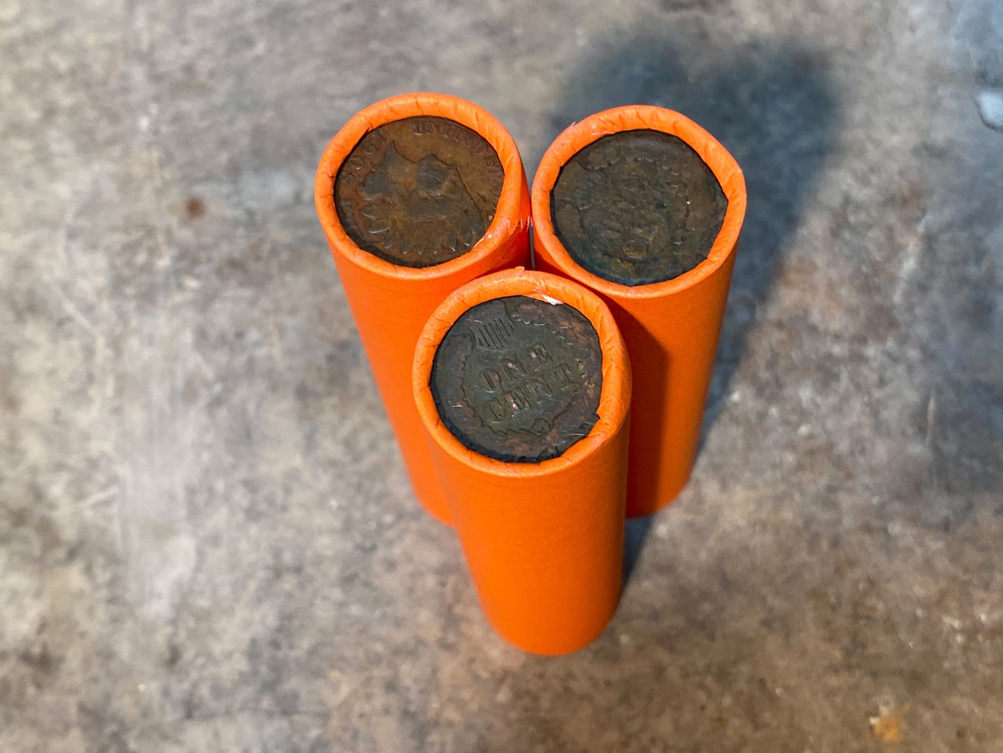 INDIAN HEAD CENT showing on end of old orange unsearched us wheat penny roll cent coins estate collection sale lot hoard