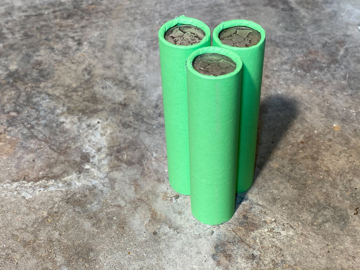 SILVER MERCURY DIME showing on vintage unsearched old light green wheat penny roll us coins estate collection cent sale pennies lot hoard