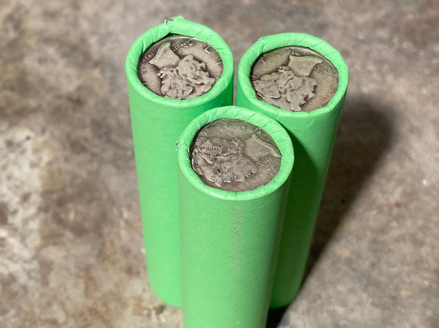 SILVER MERCURY DIME showing on vintage unsearched old light green wheat penny roll us coins estate collection cent sale pennies lot hoard